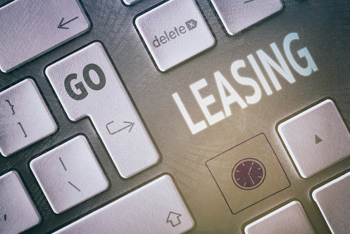 A keyboard advertising a Mazda lease