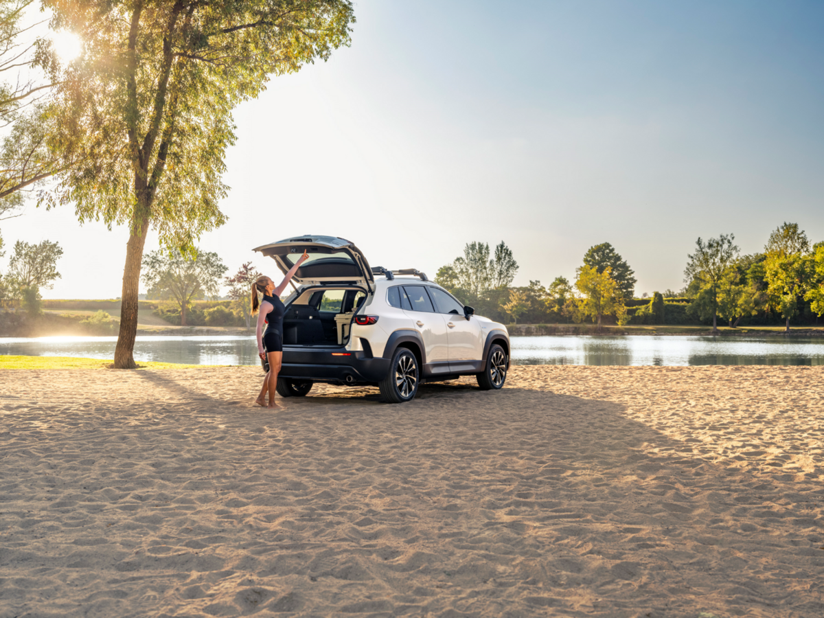 The 2026 Mazda CX-50 parked by a pond