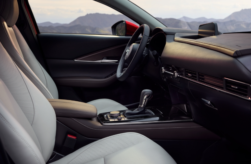 Mazda interior with leather seats and modern dashboard design at Middletown Mazda.