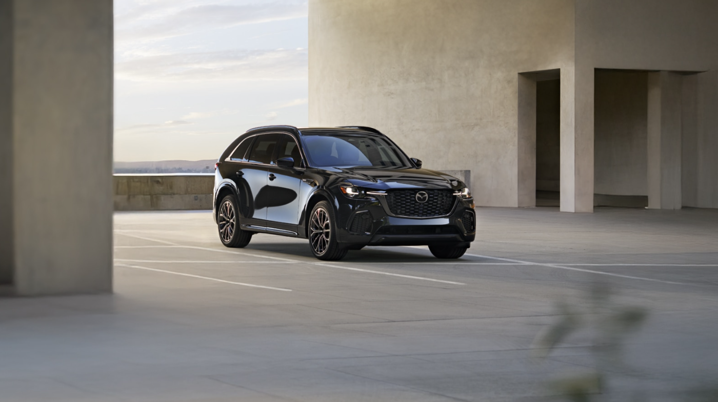 Black 2026 Mazda CX-70 in empty parking garage.